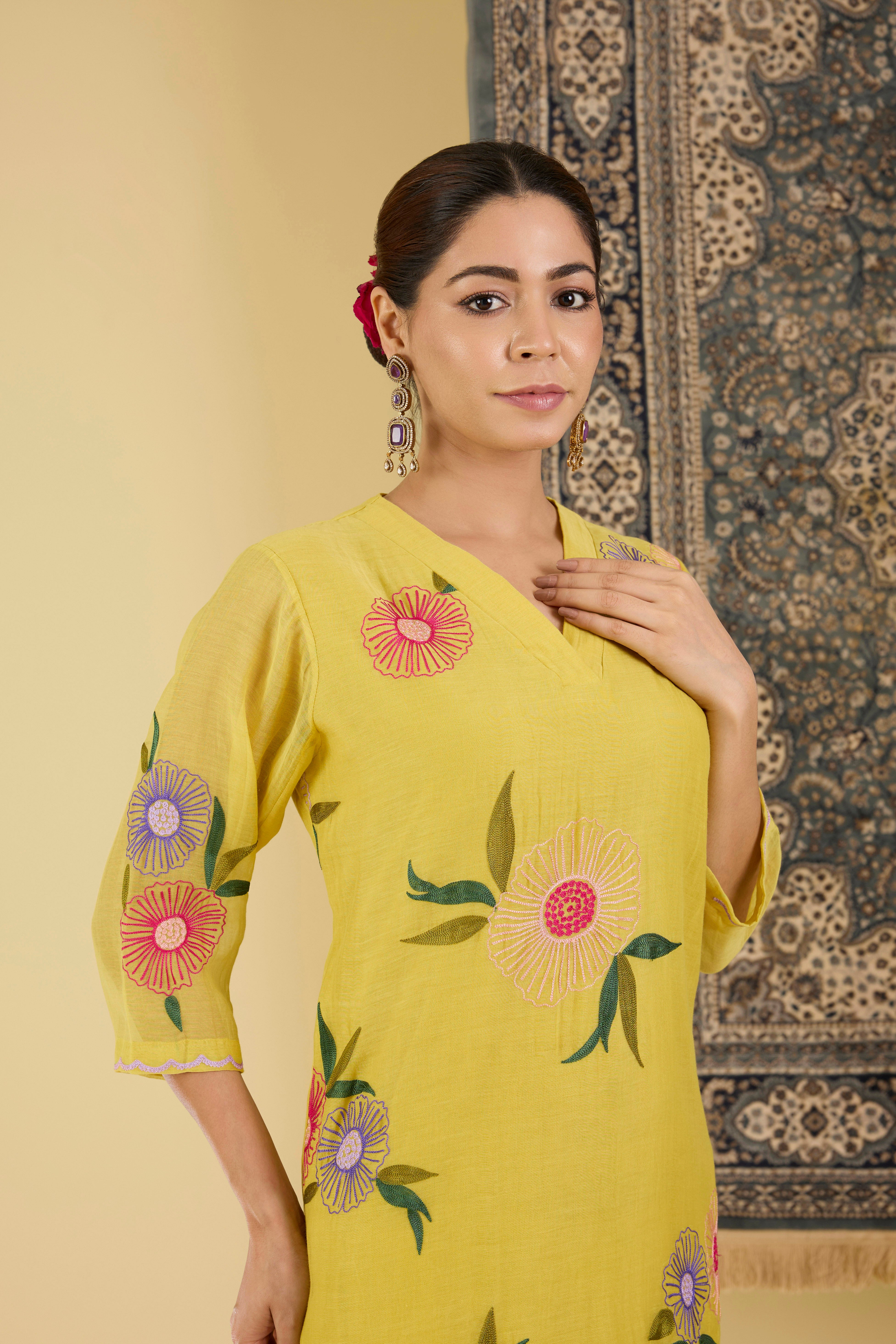 Yellow Floral Embroidered Kurta with straight pant and dupatta.