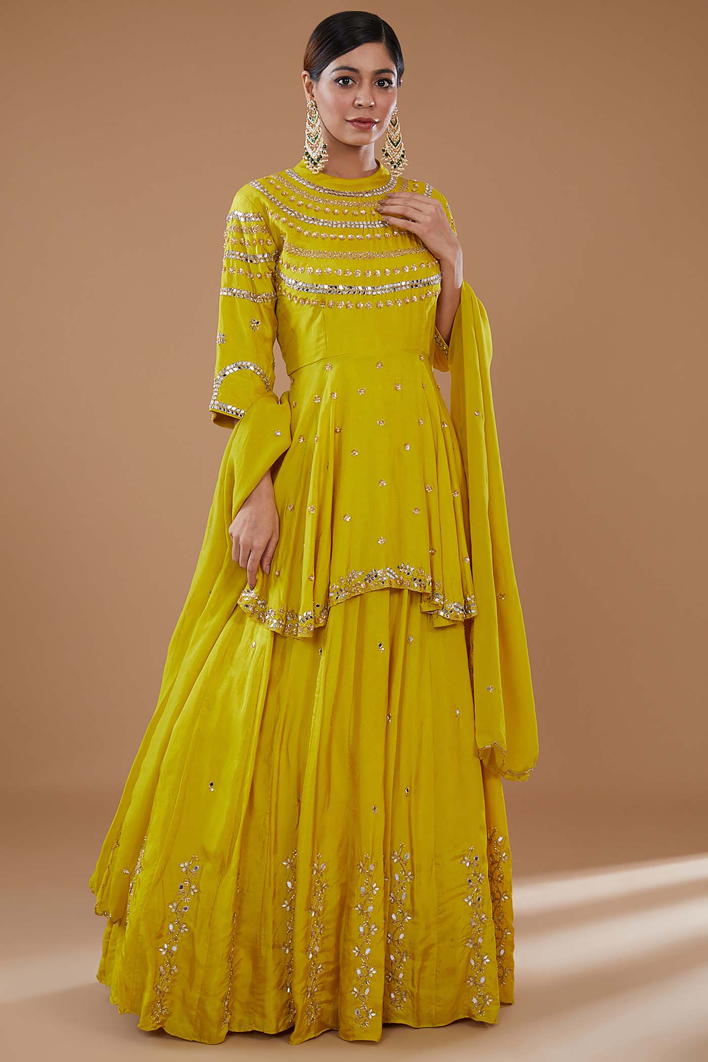 Mustard Short Anarkali with heavily Embroidered yoke and sleeves Comes with a Skirt and Dupatta