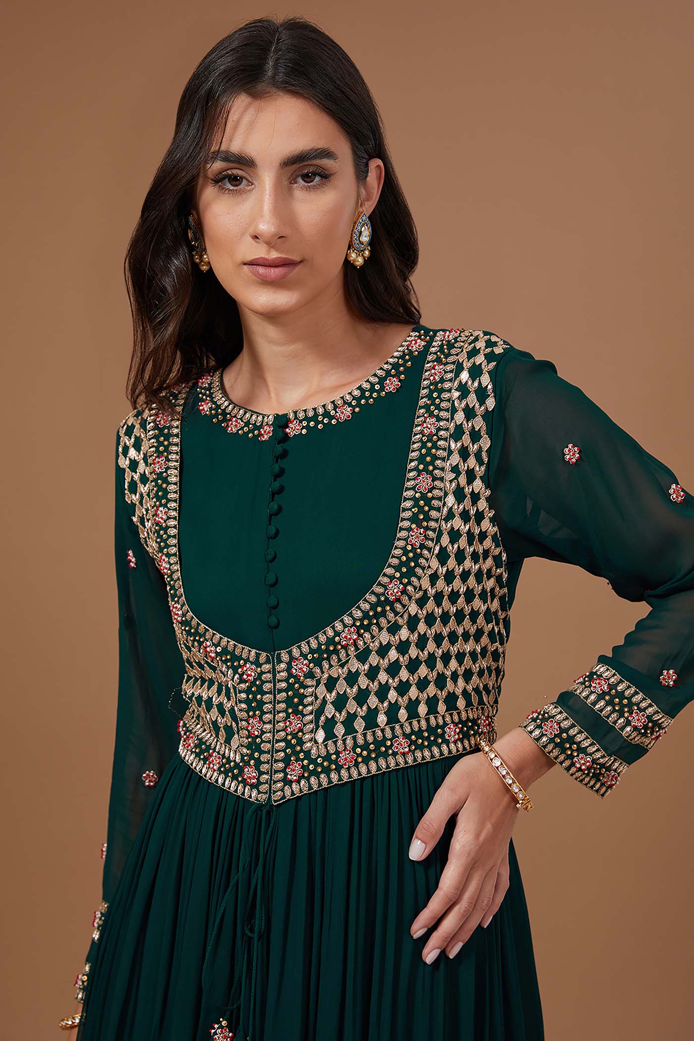 Bottle Green Tiered Anarkali with Attached Jacket and Heavy Tassles