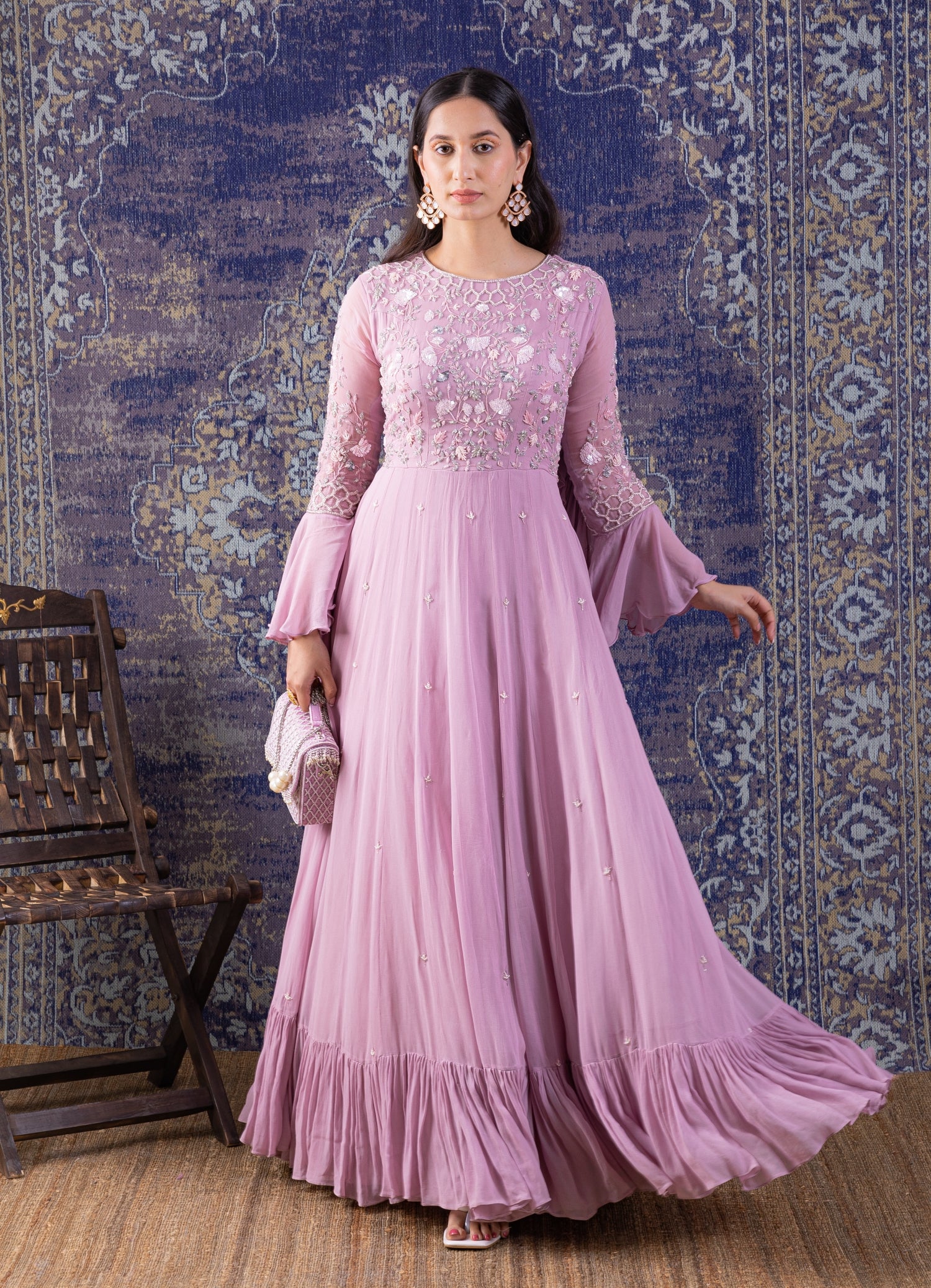 Lilac Tired Gown With Bell Sleeves.