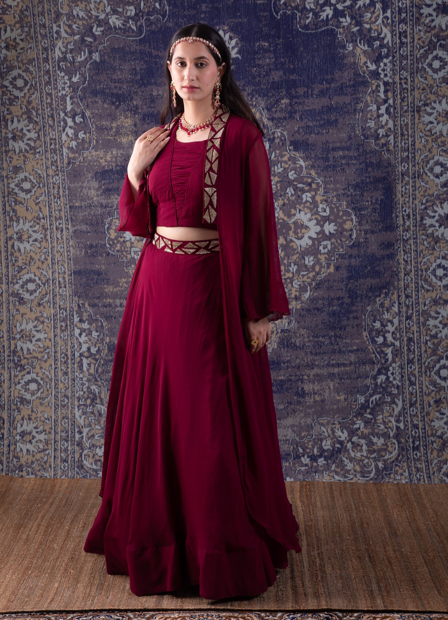 Wine Crop-Top With Embroidered Cape Lehenga Set.