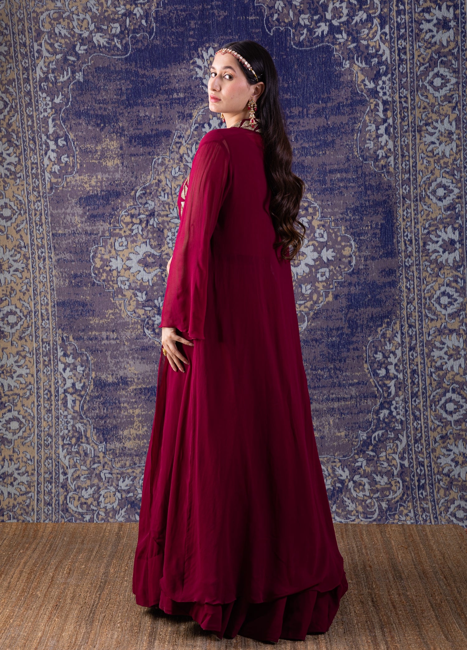 Wine Crop-Top With Embroidered Cape Lehenga Set.