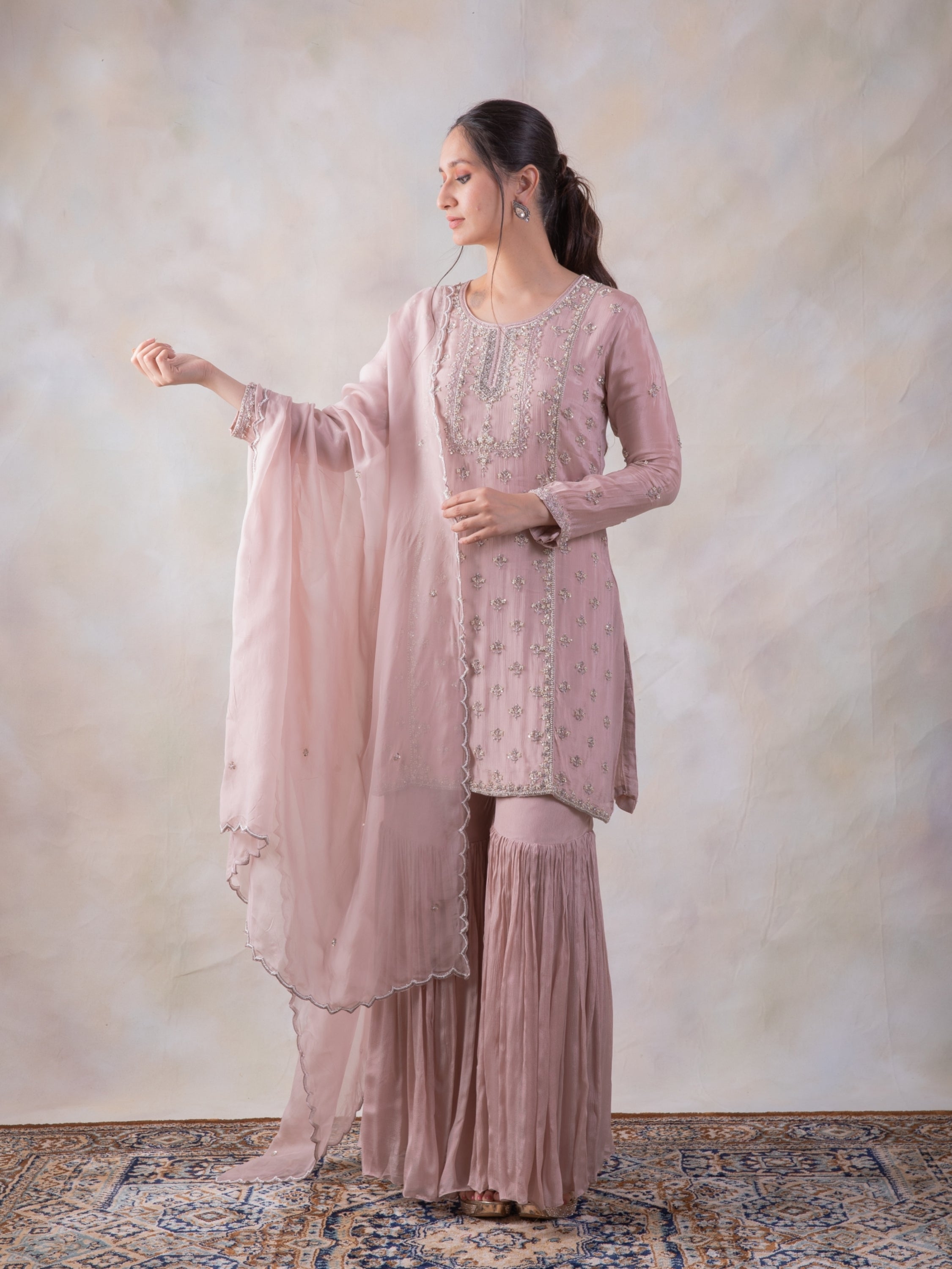 Onion Pink Sharara With Mesmerizing Cut-Dana Kurta And Dupatta.