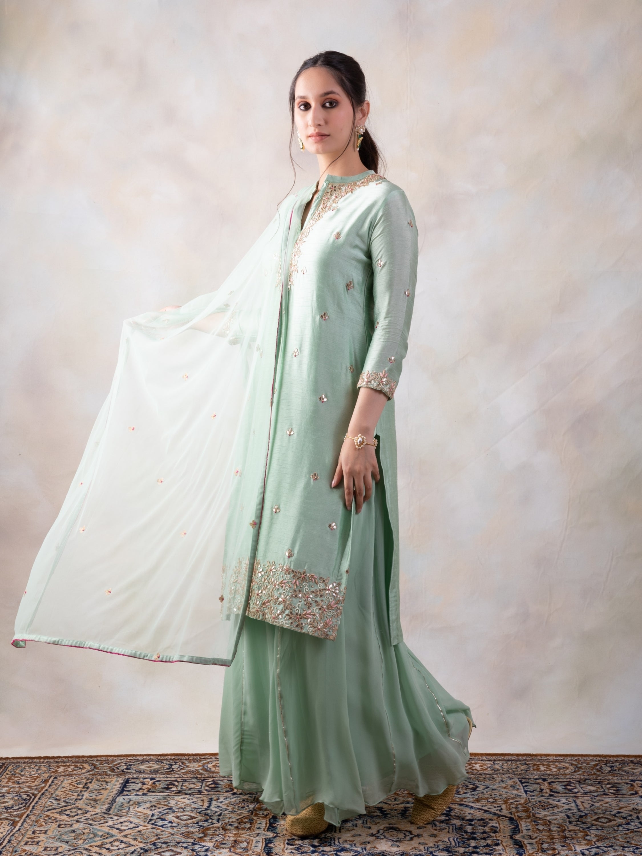 Hand Embroidered Straight Kurta Comes With A Sharara And Dupatta.