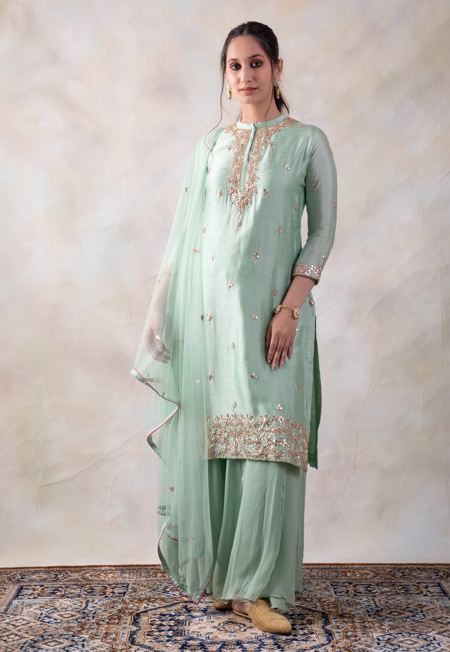 Hand Embroidered Straight Kurta Comes With A Sharara And Dupatta.