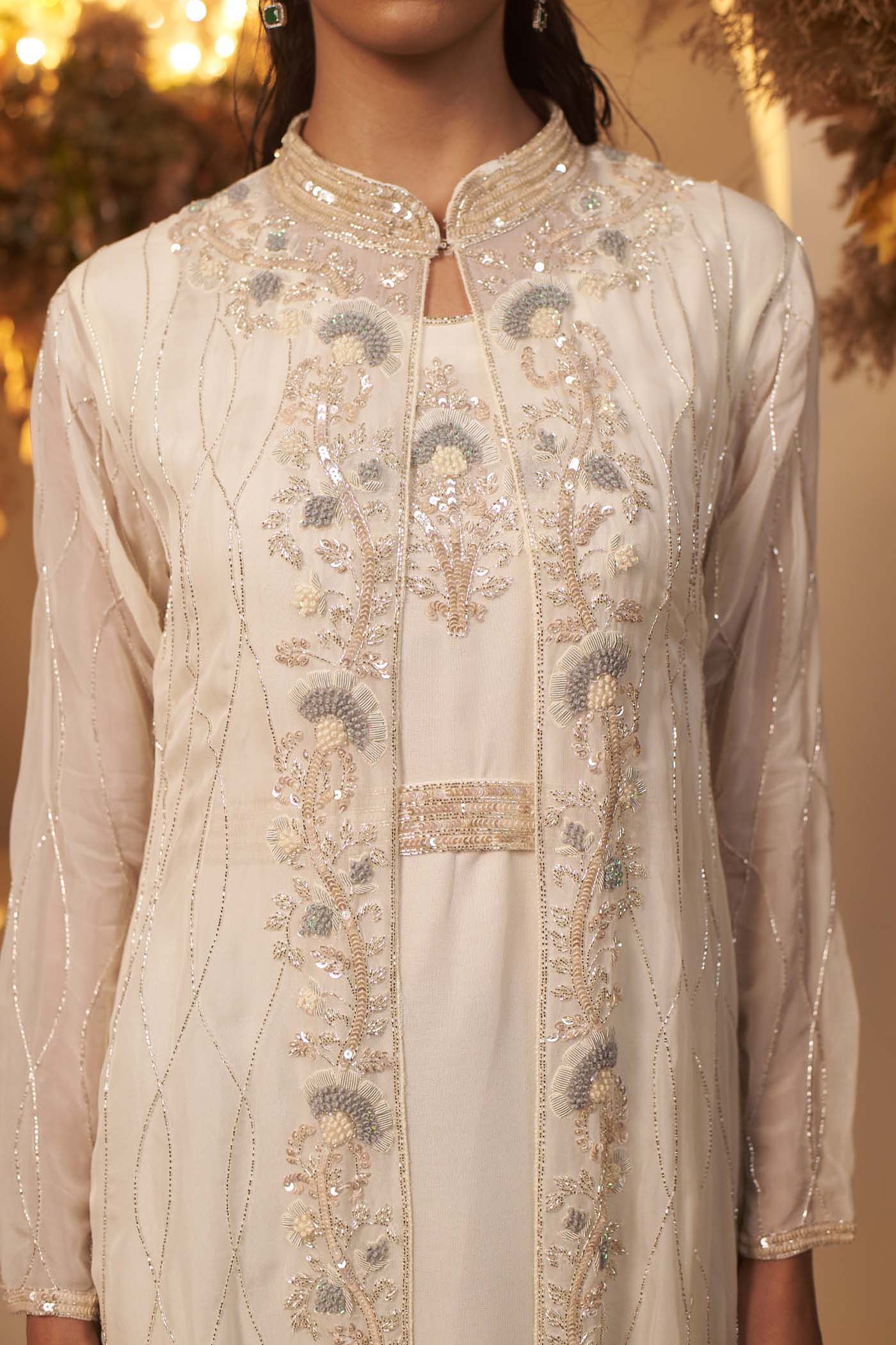 Pearl White Gown Paired with a highlighted jacket set