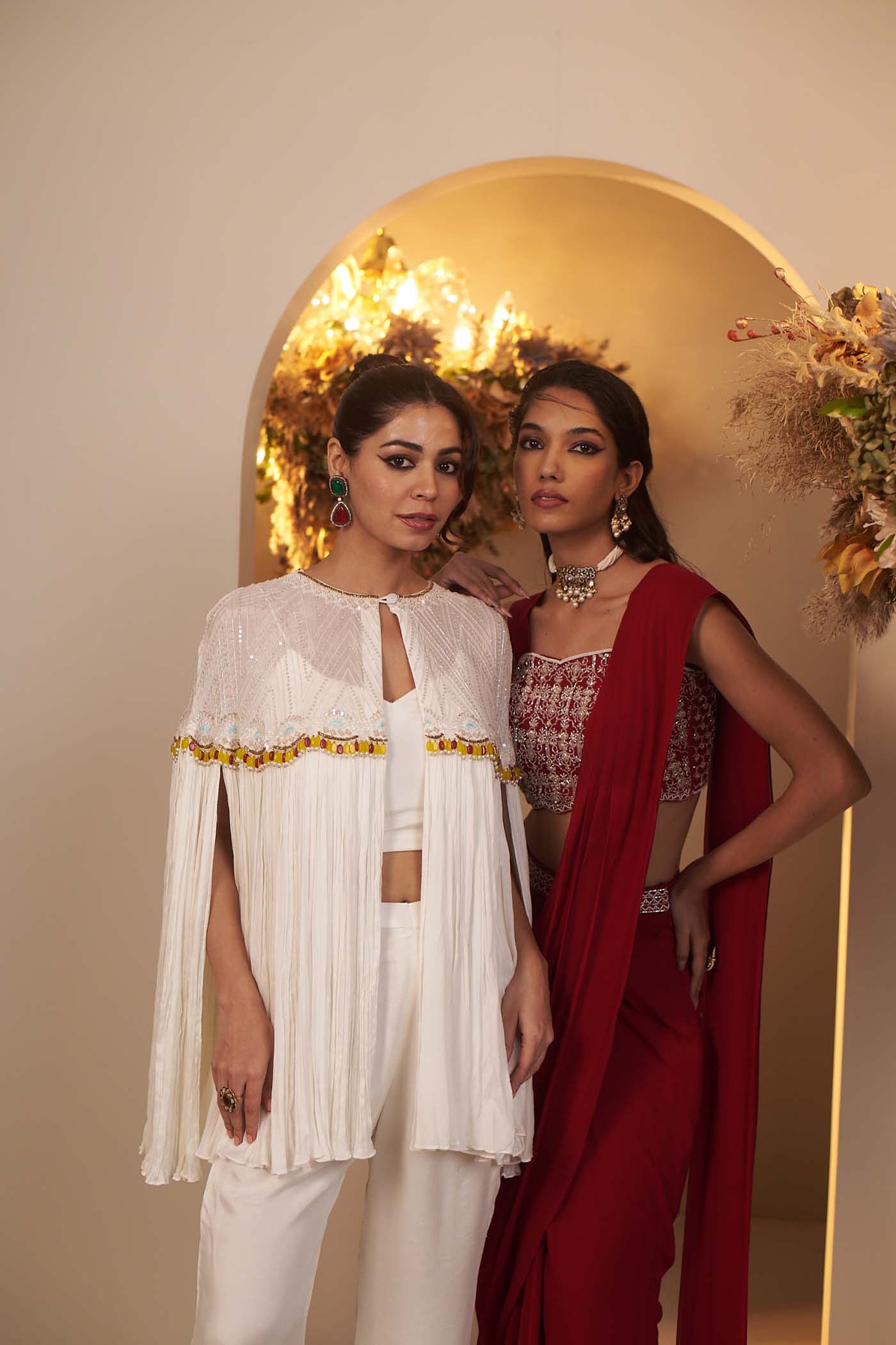 Pearl White has a flowy pant and blouse Set