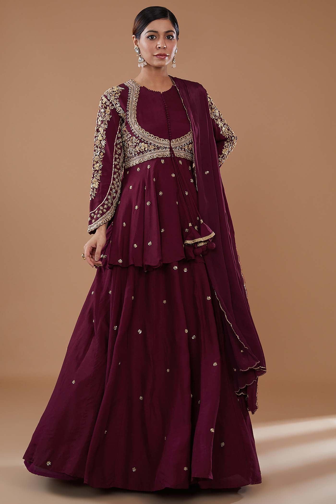 Wine Short Anarkali with heavily Embroidered yoke and sleeves Comes with a Skirt and Dupatta