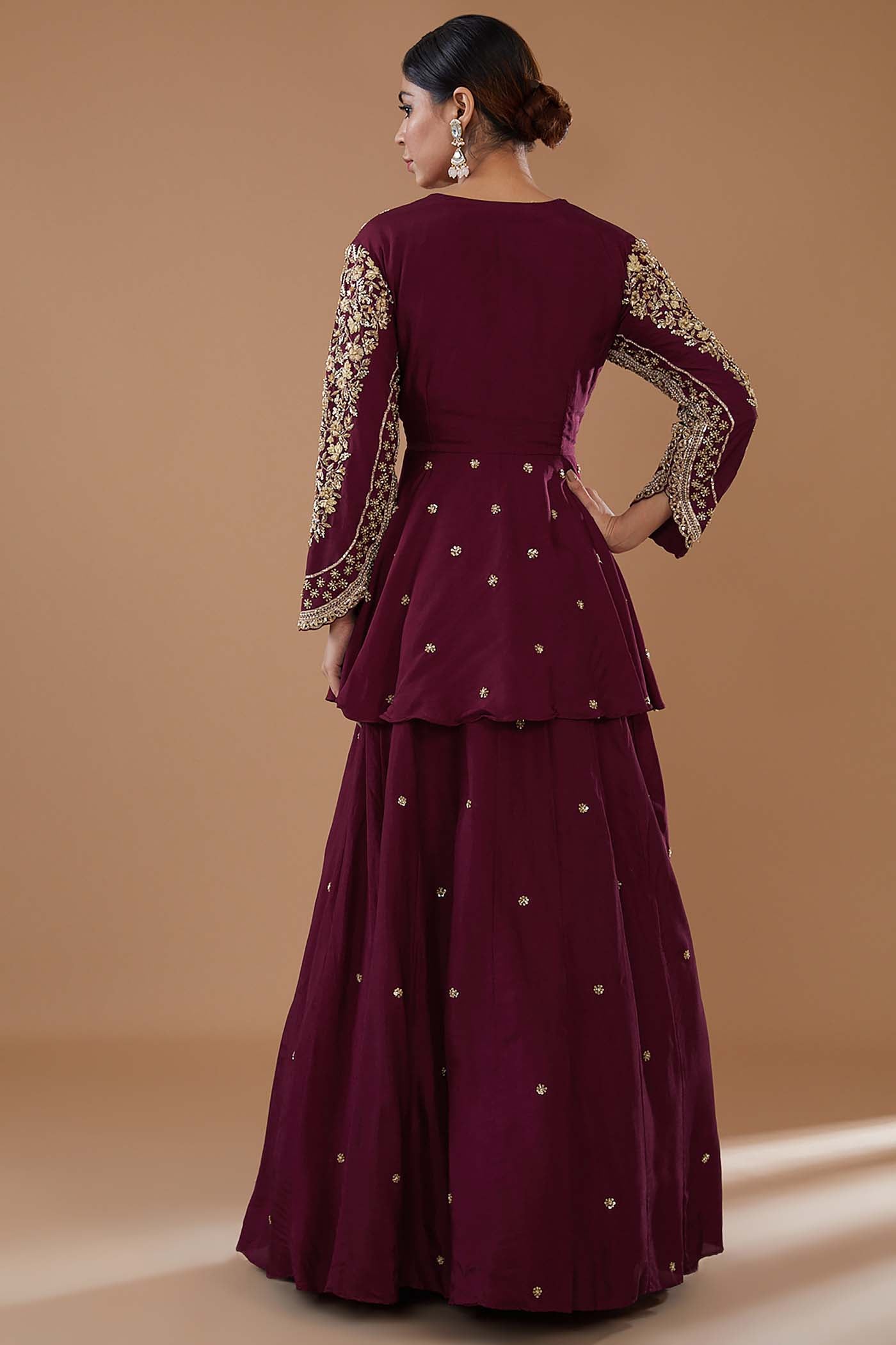 Wine Short Anarkali with heavily Embroidered yoke and sleeves Comes with a Skirt and Dupatta