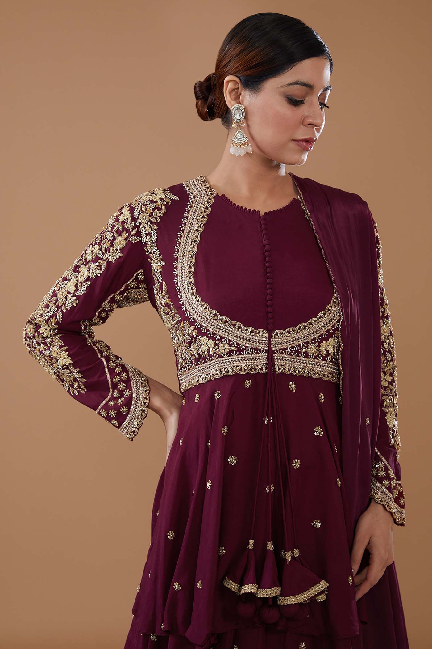 Wine Short Anarkali with heavily Embroidered yoke and sleeves Comes with a Skirt and Dupatta