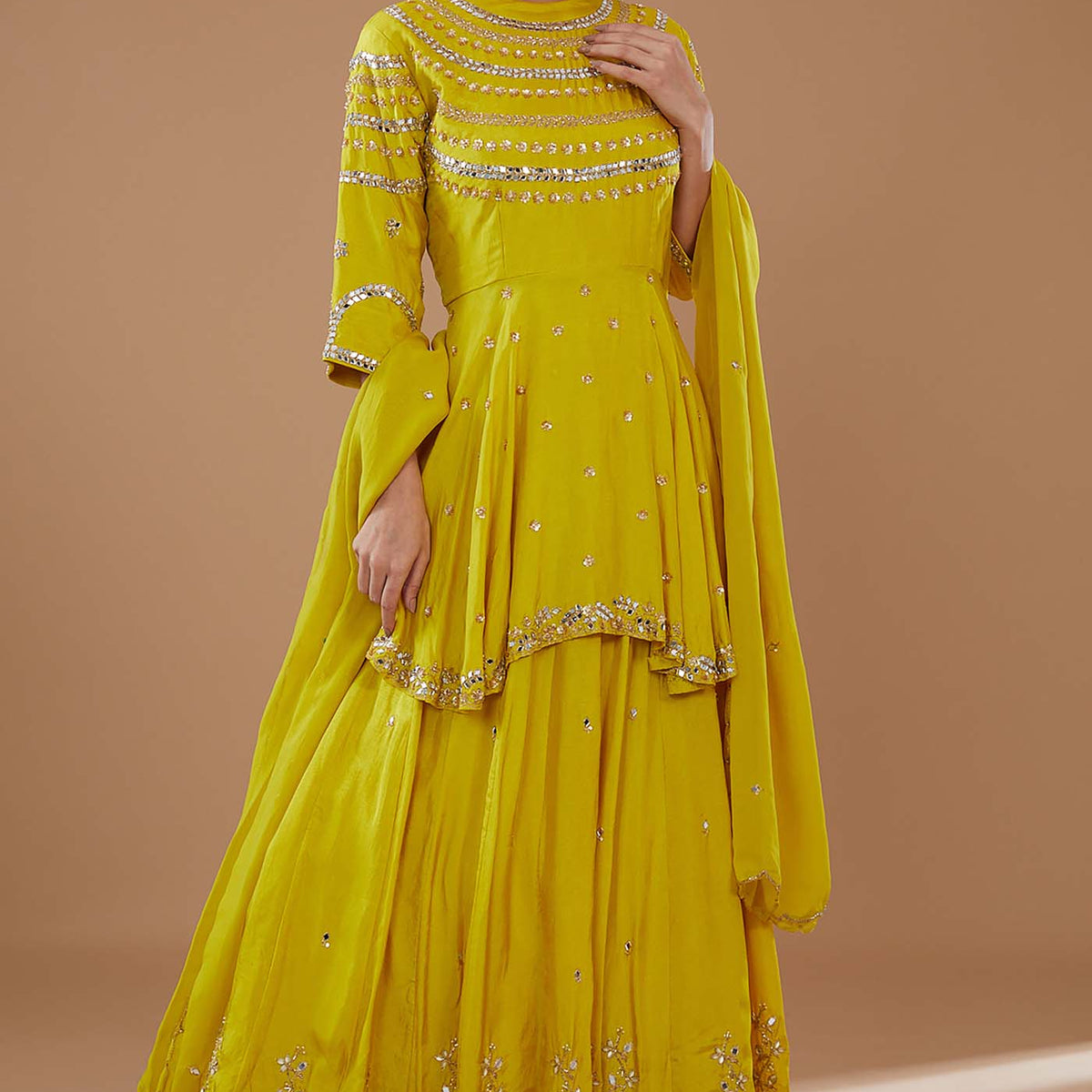 Mustard Short Anarkali with heavily Embroidered yoke and sleeves Comes Mustard Short Anarkali with heavily Embroidered yoke and sleeves Comes