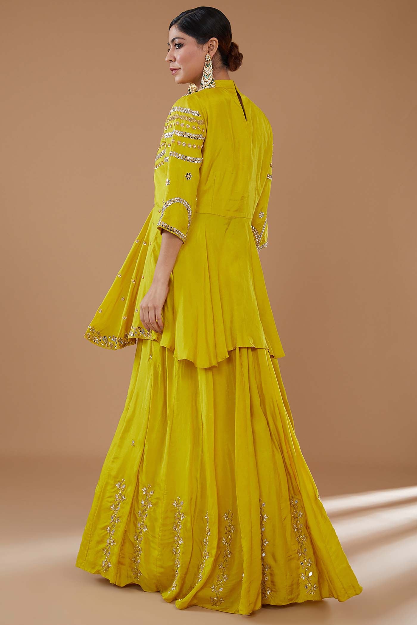 Mustard Short Anarkali with heavily Embroidered yoke and sleeves Comes with a Skirt and Dupatta