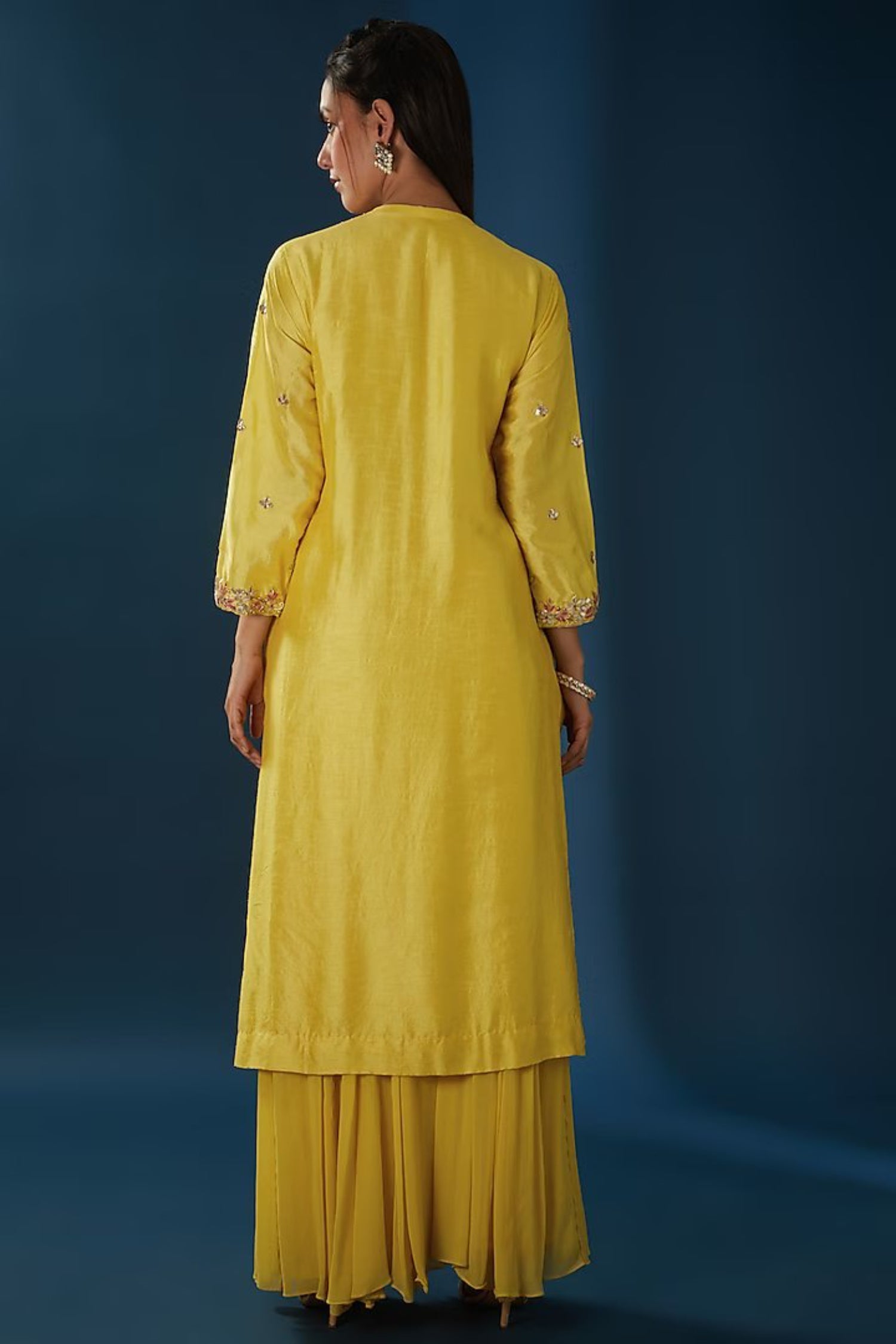 Yellow Embroidered Straight Kurta Comes With A Sharara And Dupatta.