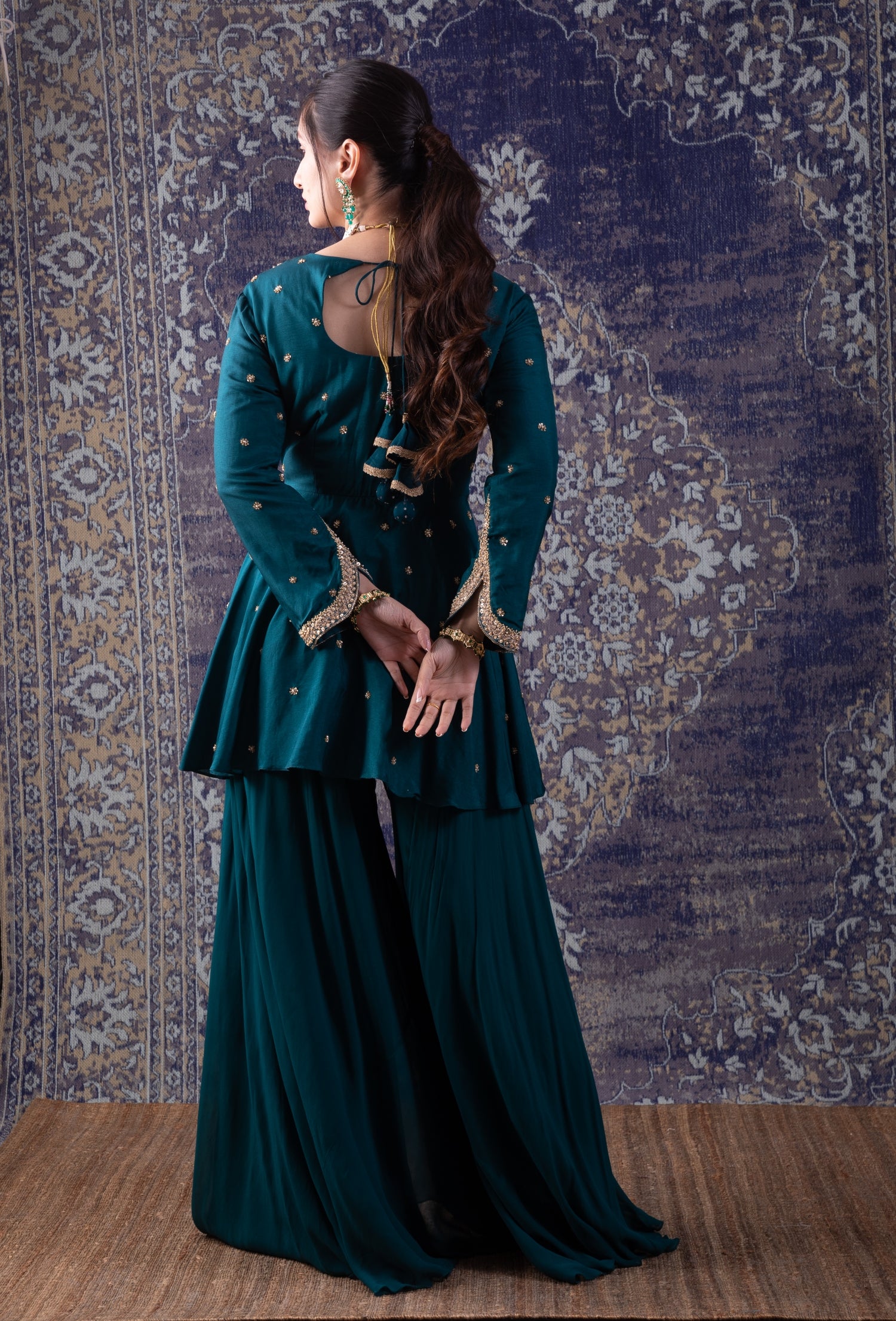 Rama Green Peplum Top With A Flared Palazzo And Embellished Dupatta.