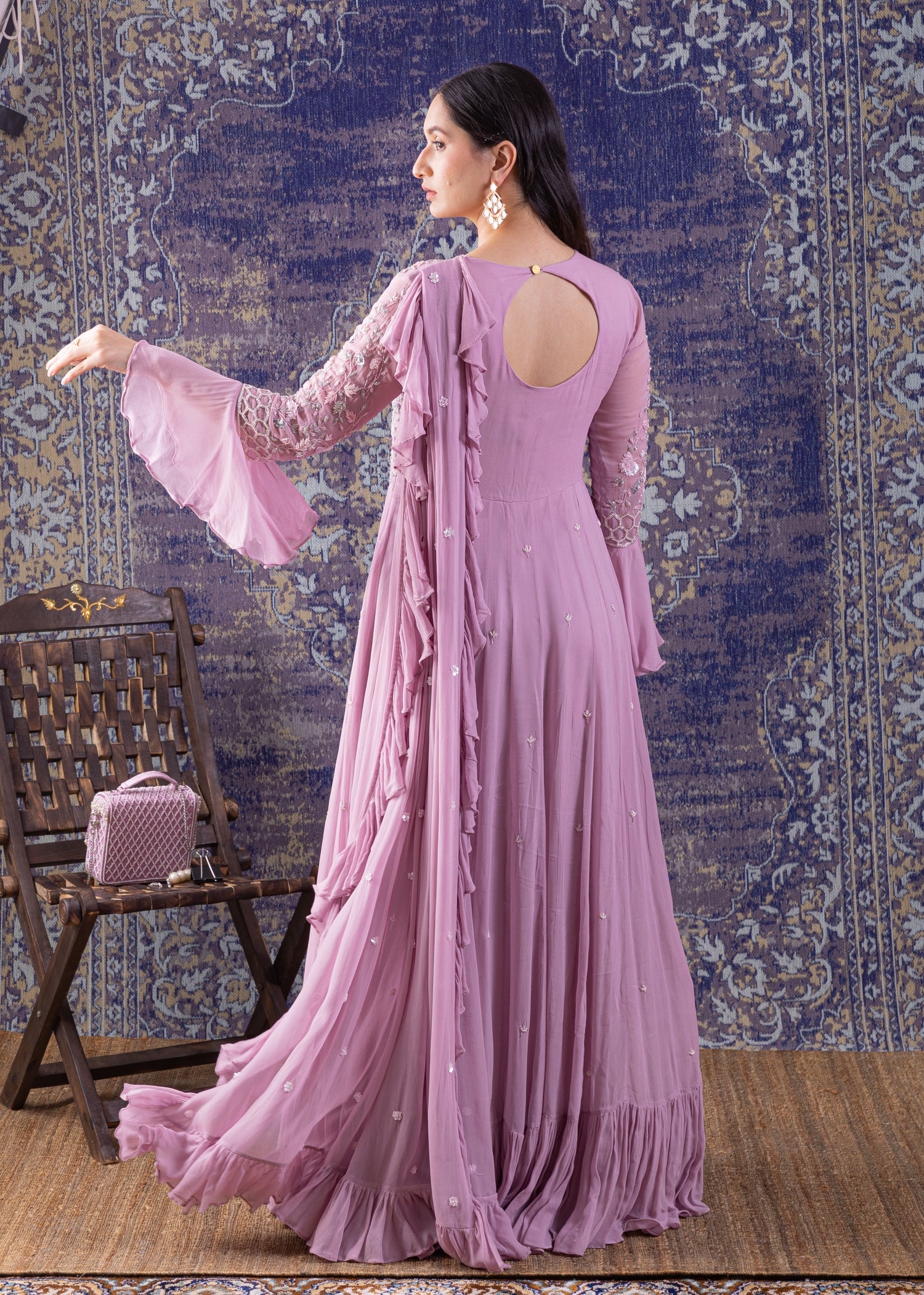 Lilac Tired Gown With Bell Sleeves.