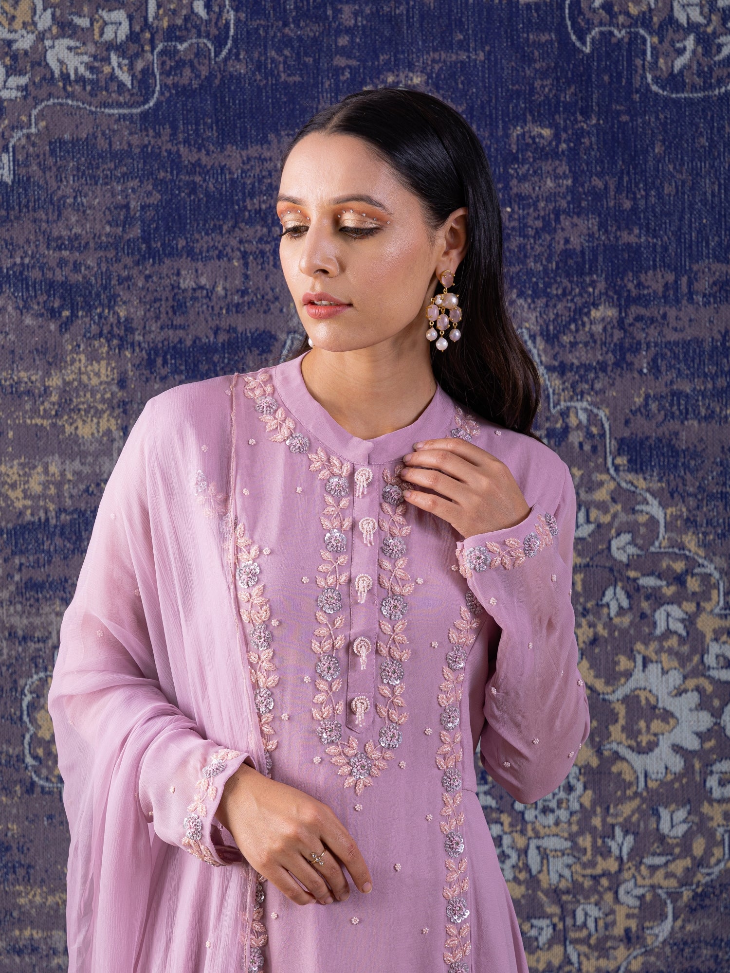 Lilac Asymmetrical Anarkali With With A Dupatta.