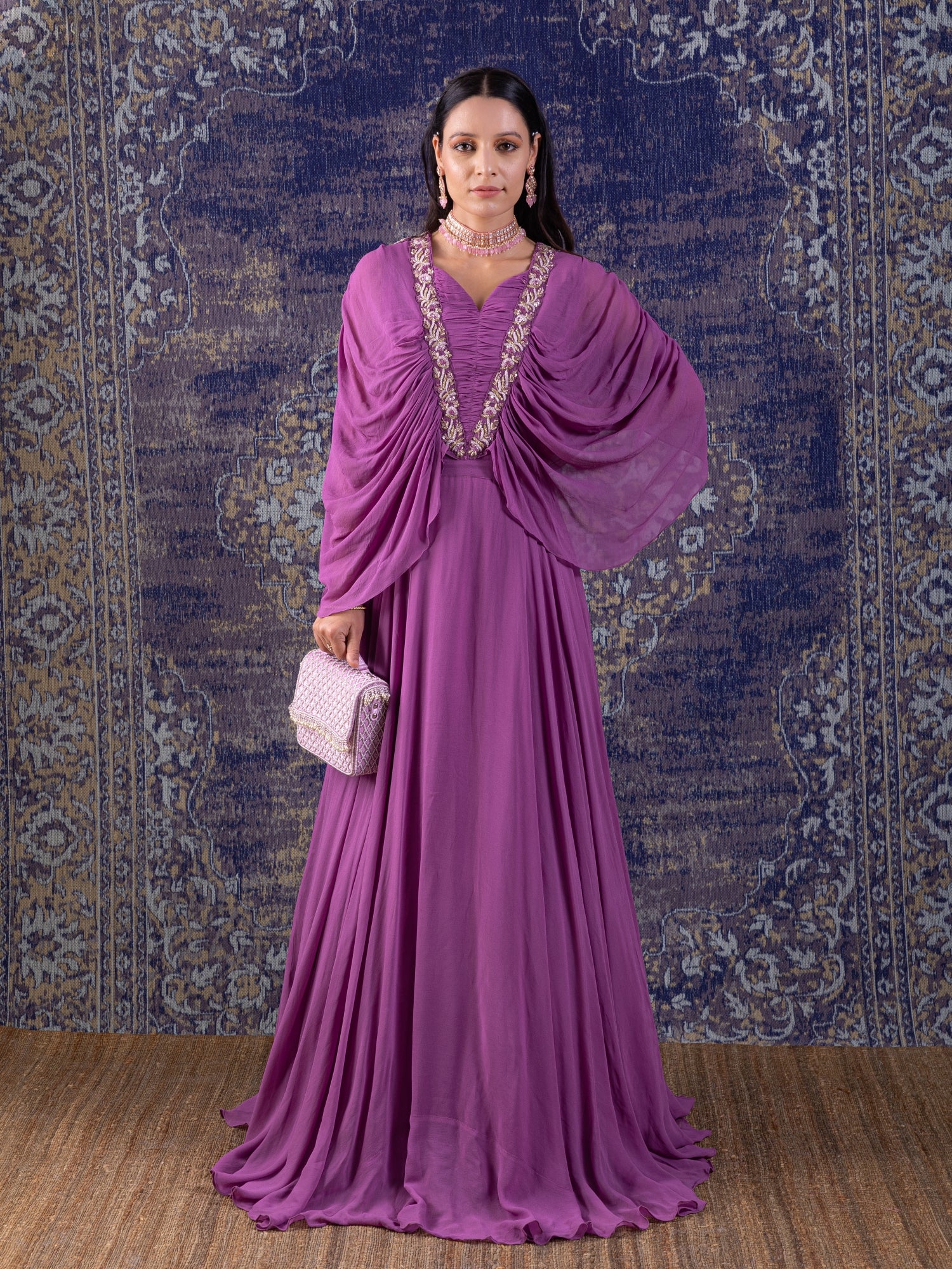 Lilac Gown With Ruching With Long Flowing Layered Sleeves.