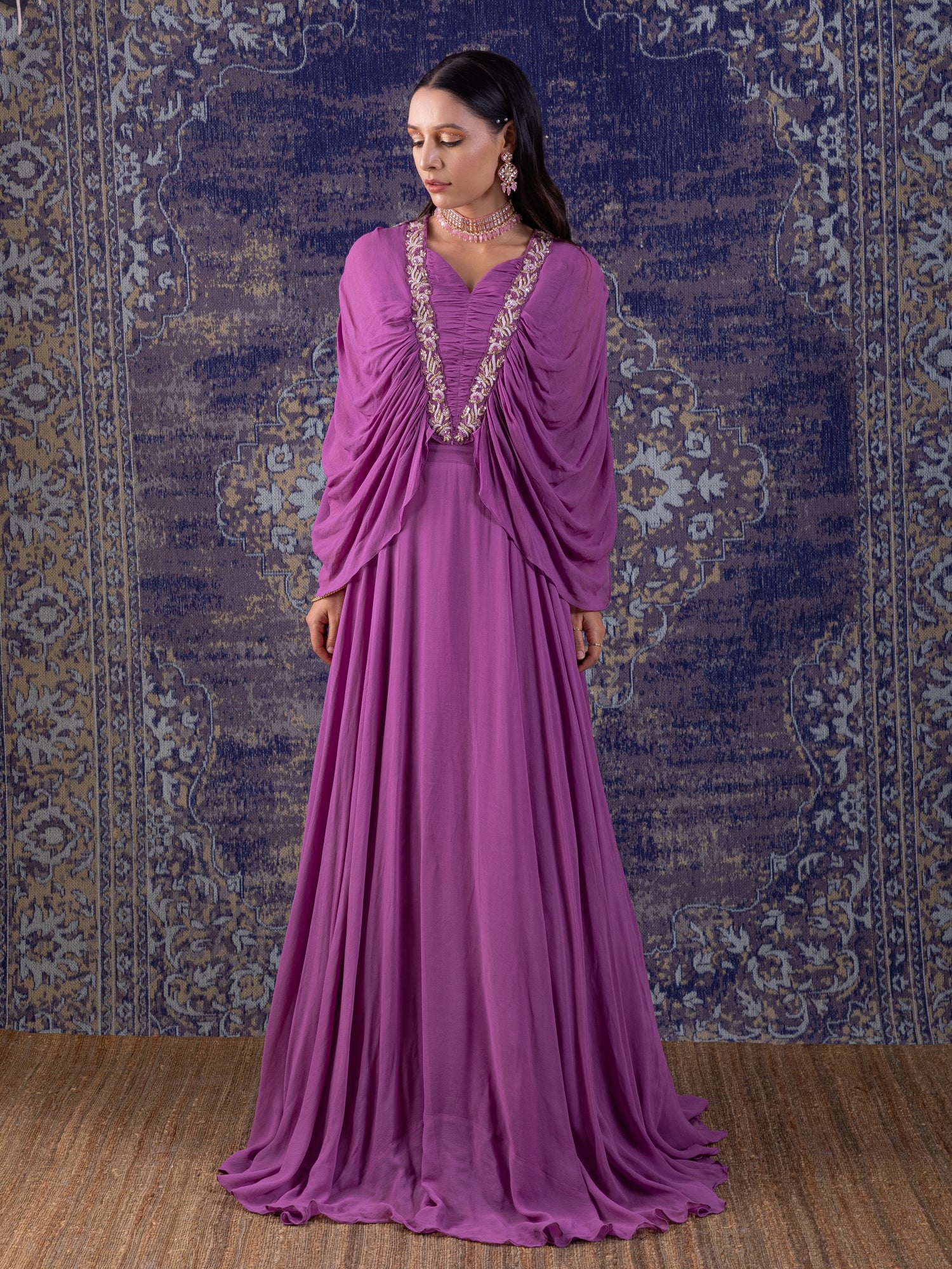 Lilac Gown With Ruching With Long Flowing Layered Sleeves.