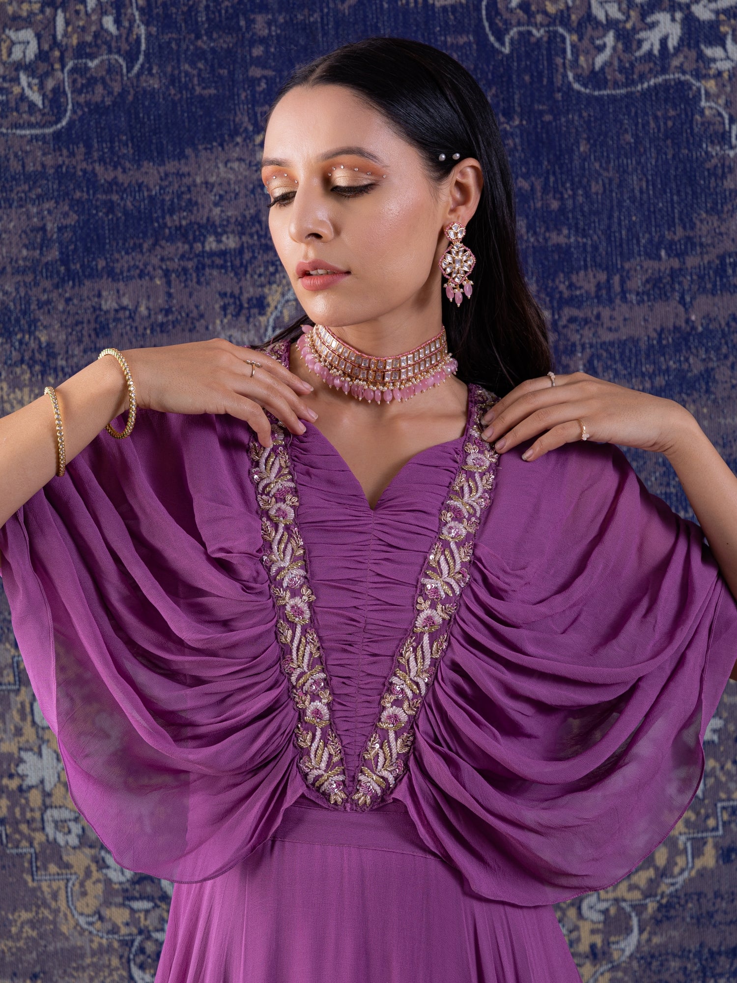 Lilac Gown With Ruching With Long Flowing Layered Sleeves.