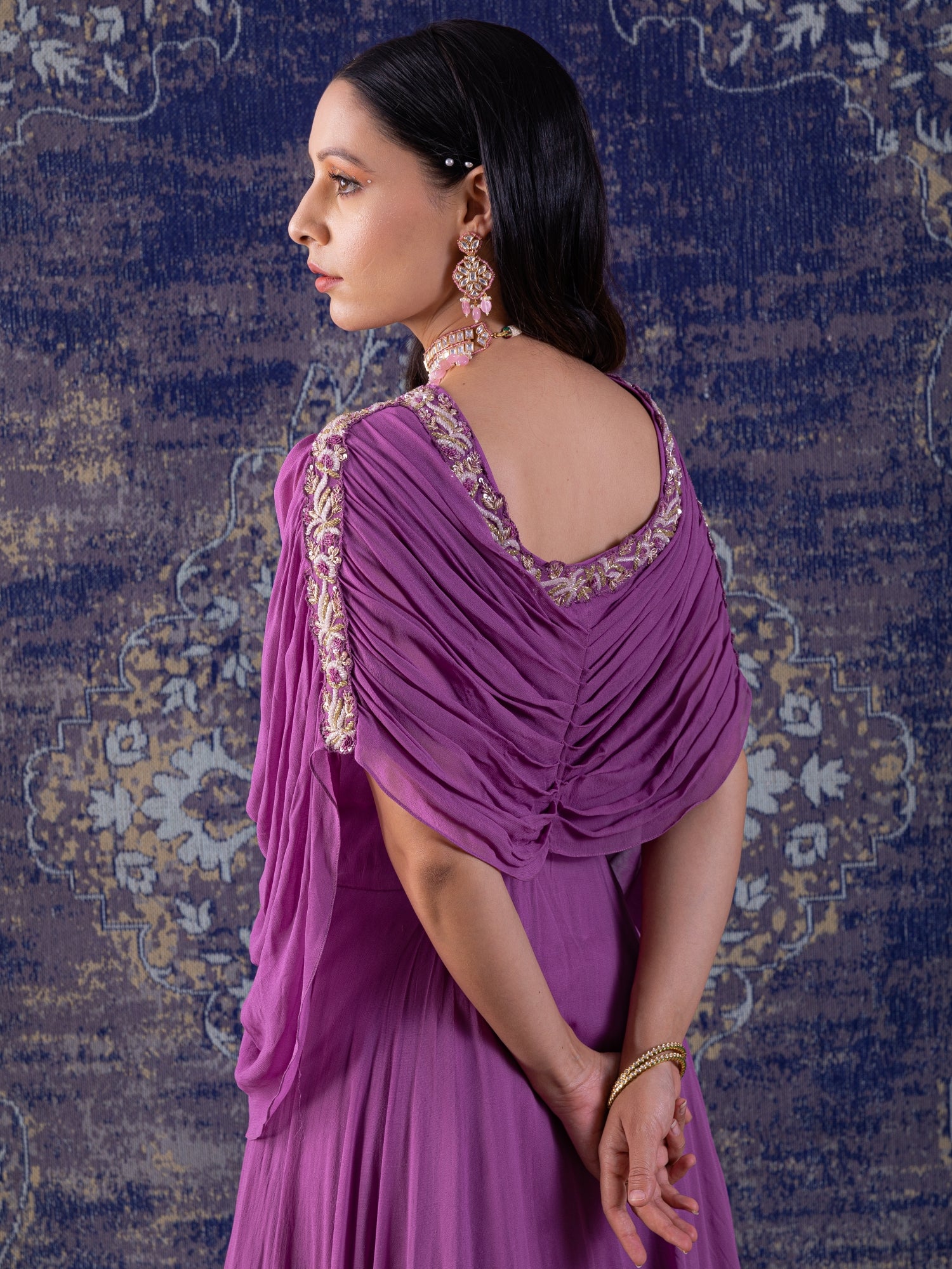 Lilac Gown With Ruching With Long Flowing Layered Sleeves.