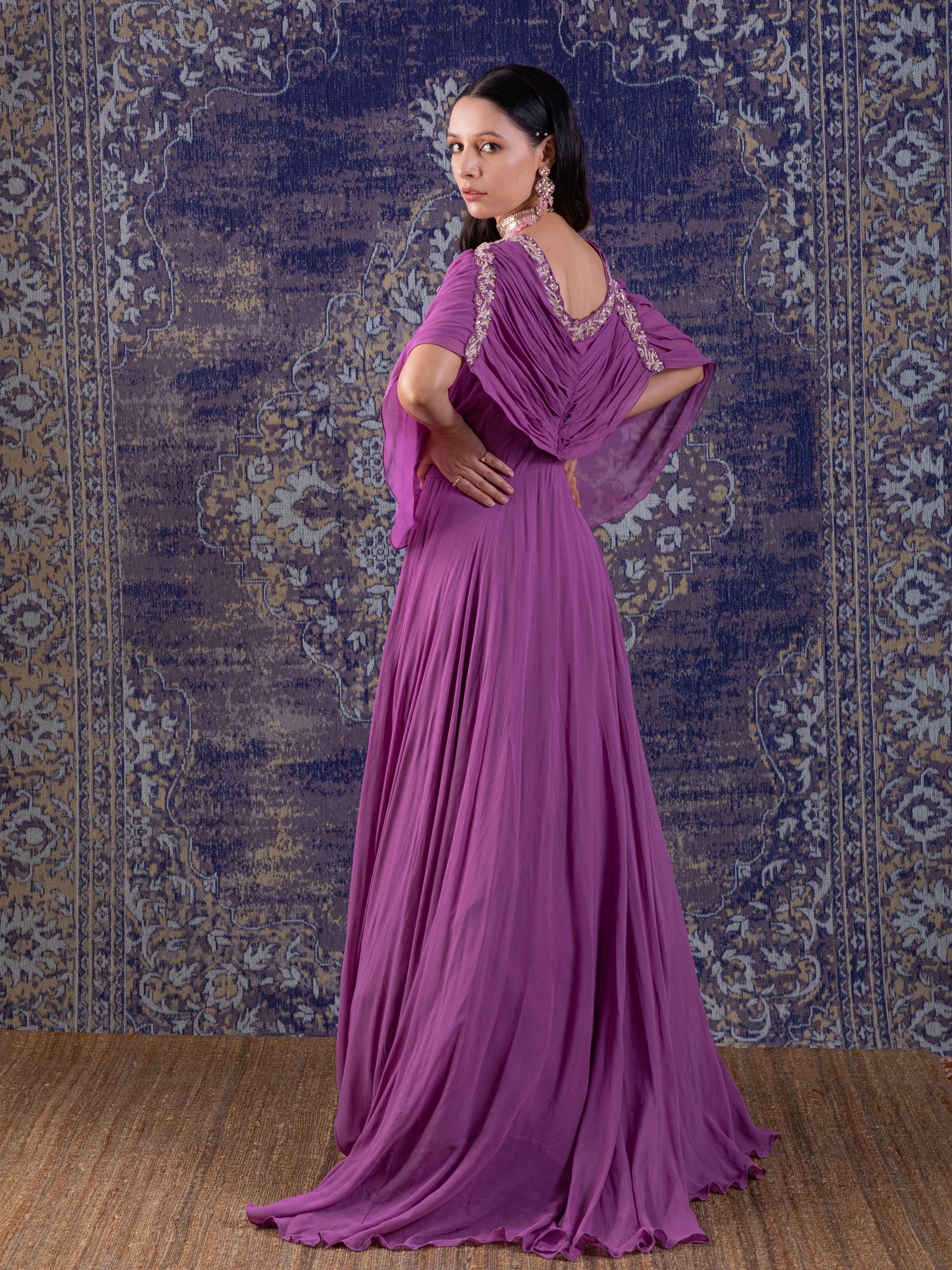 Lilac Gown With Ruching With Long Flowing Layered Sleeves.