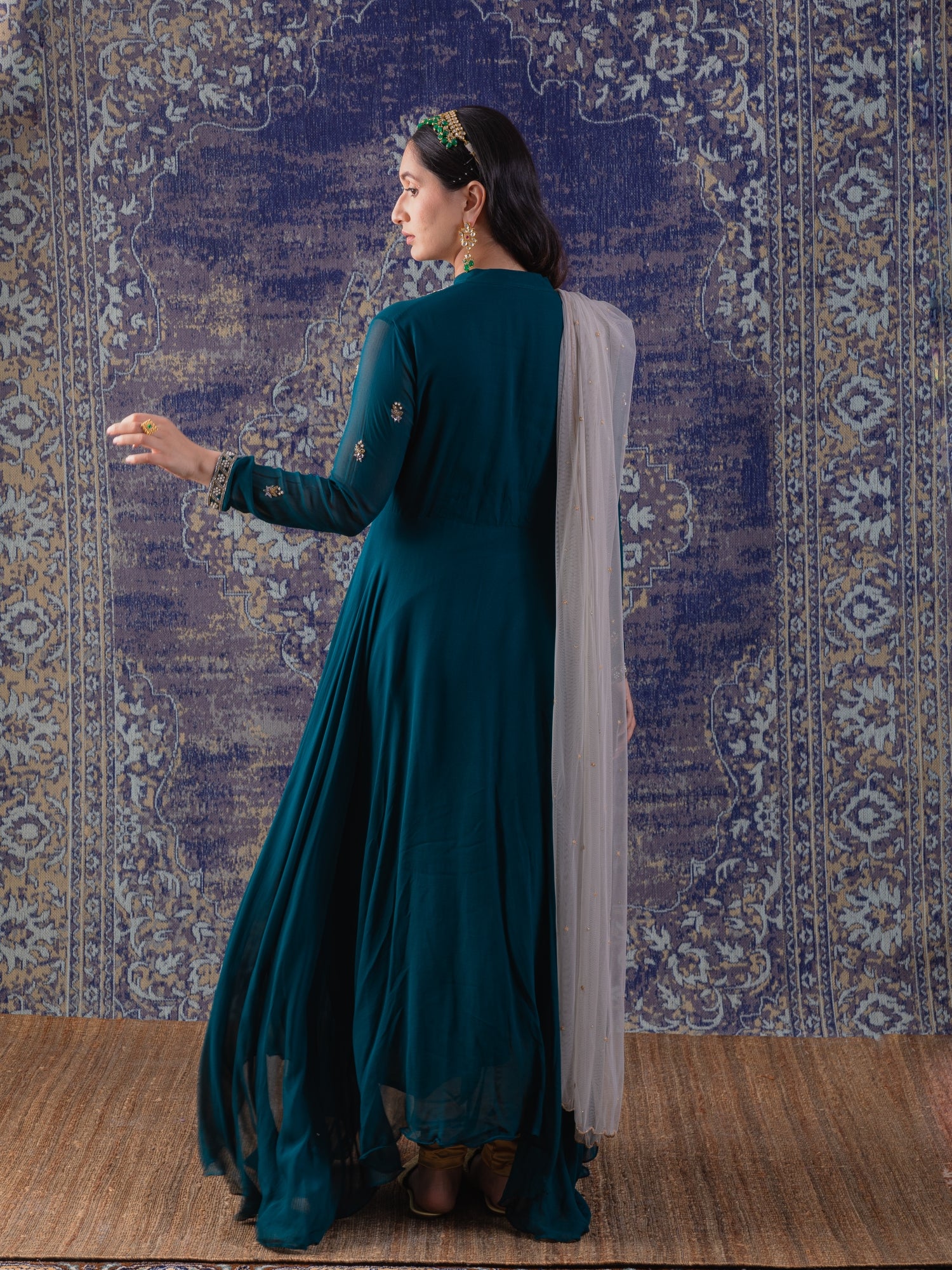 Rama Green Asymmetrical Anarkali With A Dupatta.