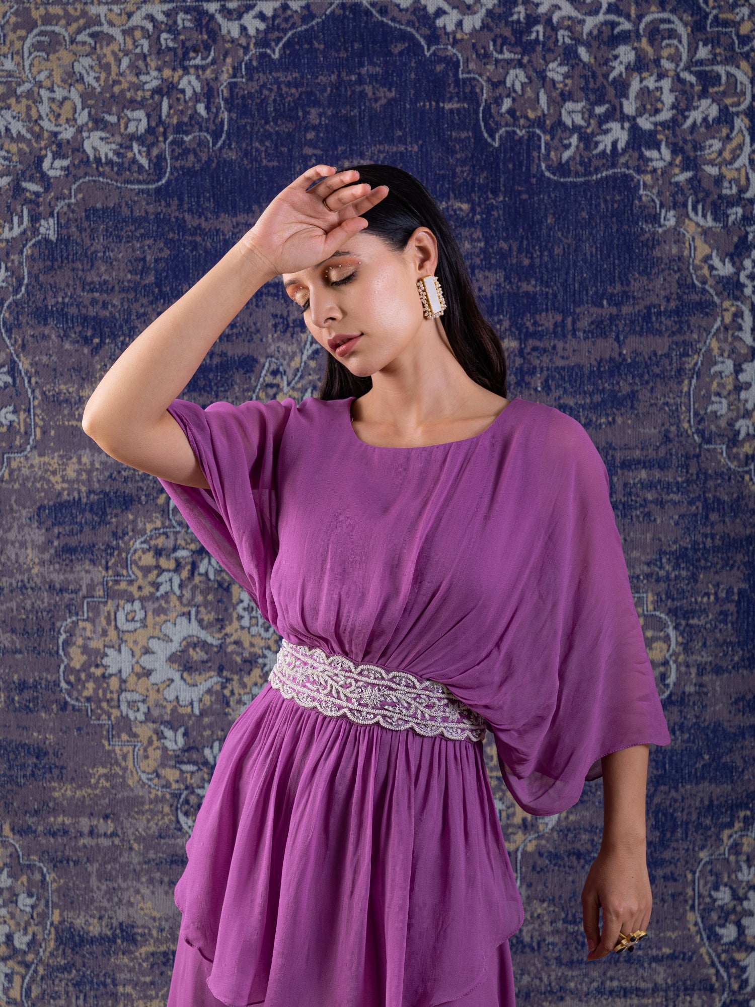 Lilac Peplum Top With Hand Embroidery On The Waist Paired With A Sharara.