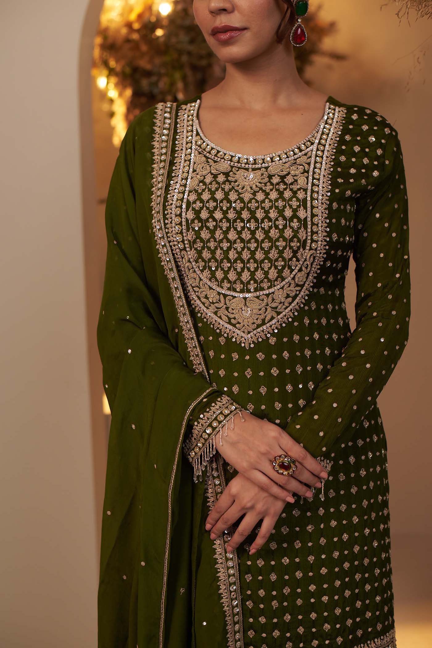 Olive Green rich and intricately embroidered kurta Set