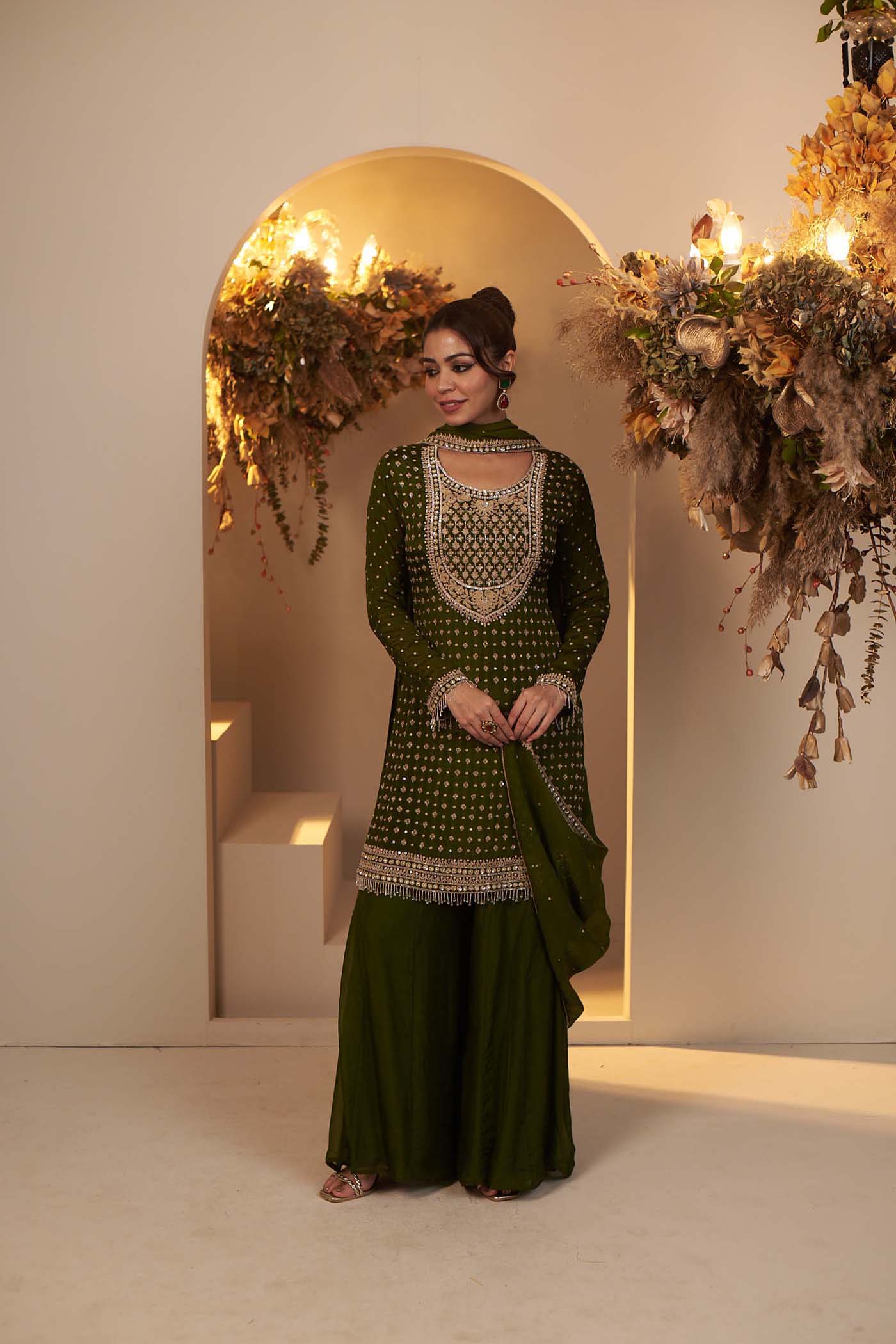 Olive Green rich and intricately embroidered kurta Set